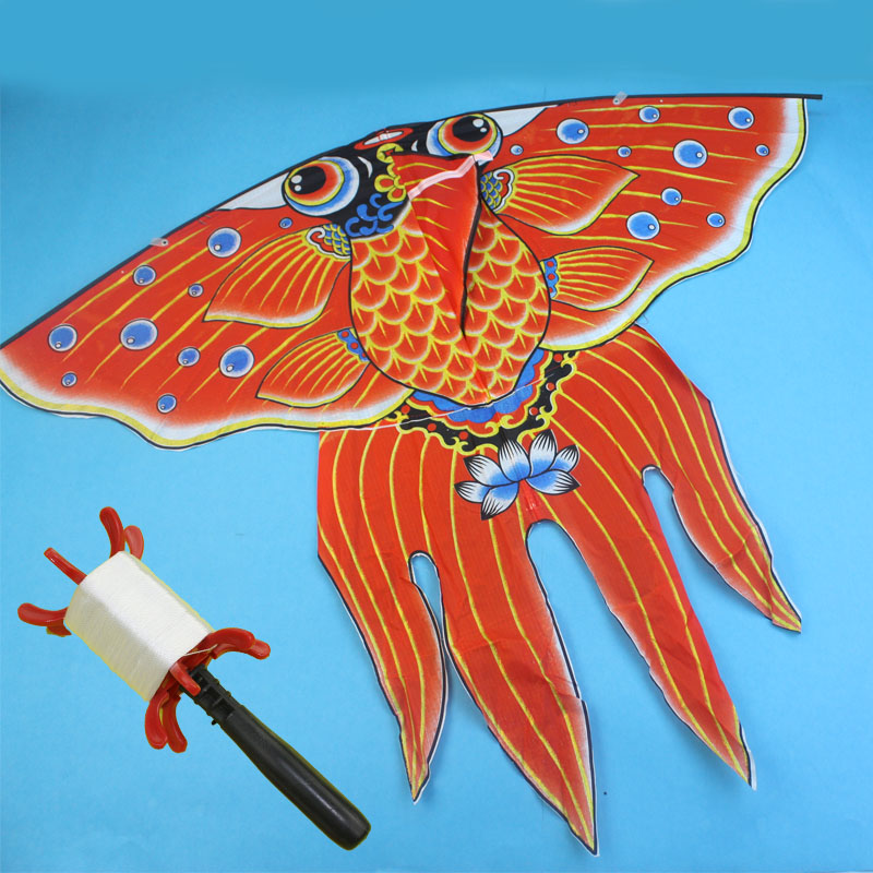 Goldfish kite girl loves to be beautiful and easy to fly outdoors to take a flying tour to play and send kids presents summer