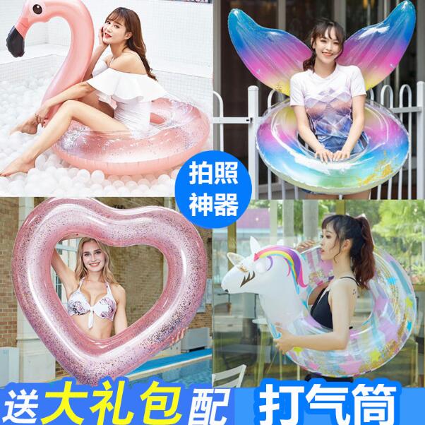 Girls pose for pictures swimming circle props Swimming learning to look good water mistake music Love to collect swans cute inflatable PV