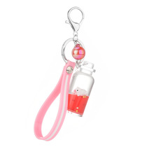 Shaking sound Net red floating milk bottle star pig accessories oil-filled liquid quicksand car keychain bag pendant