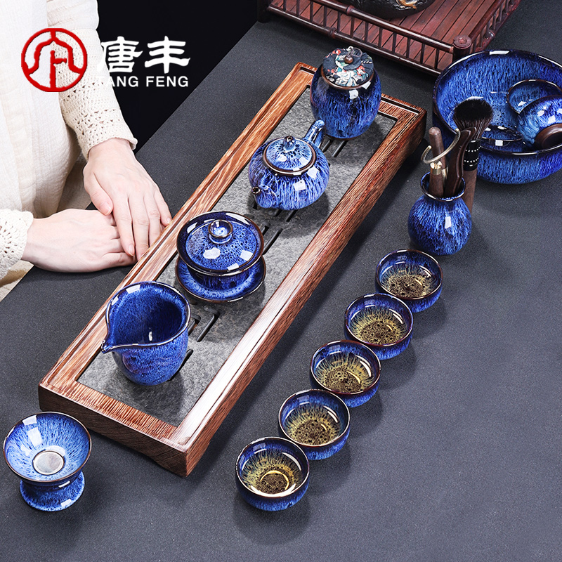 Tang Fengjian light tea suit household kung fu tea is red glaze ceramic teapot teacup tea taking with zero obsidian