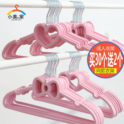 A creative pink heart-shaped bow plastic clothes hanger for student dormitories, a cute anti-slip clothes hanger