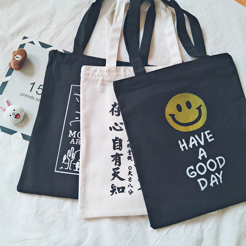 Korea ins casual wild canvas bag female zipper environmental protection shopping bag Simple letter portable shoulder bag bag