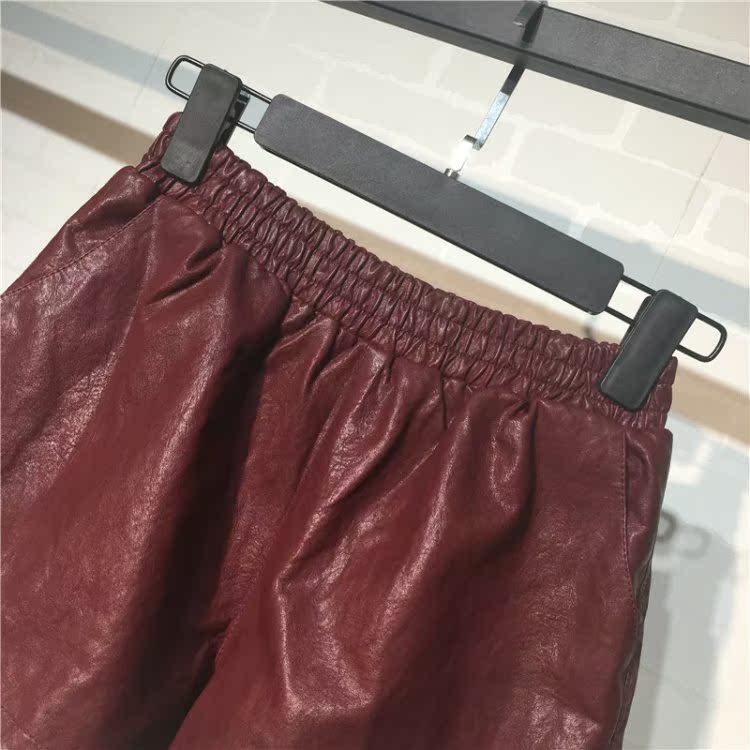 Phiên bản Hàn Quốc mát mẻ của quần short da nữ mùa thu đông co giãn eo cao rộng rộng chân rộng quần hoang dã mặc quần bốt quần short nữ kaki