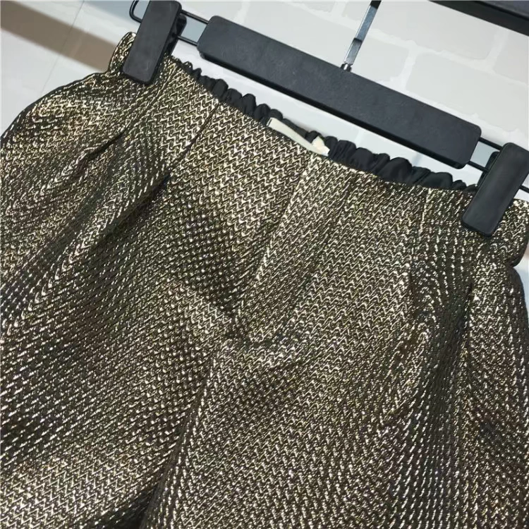 Mát mẻ mùa thu mới vàng co giãn eo quần short nữ sinh lỏng lẻo quần rộng chân rộng quần hoang dã