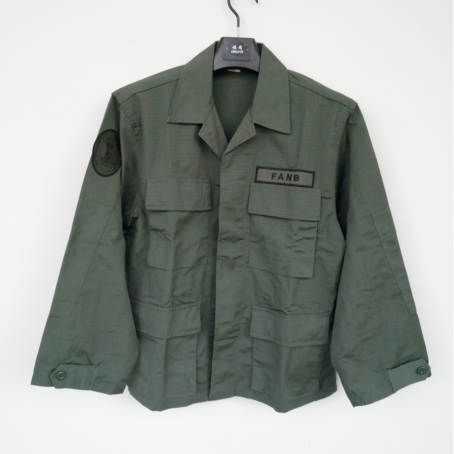 Brand new stock foreign trade work clothes grid cotton polyester casual multi-pocket pure color long sleeve machine for spring and autumn summer turnover