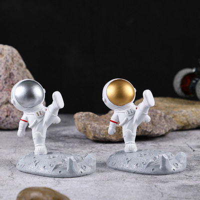 Spaceman mobile phone holder night light spaceman ornaments creative resin crafts pen holder student graduation gift
