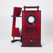 Second-hand old-fashioned wooden retro rotary dial telephone can answer nostalgic collection of ornaments and old objects