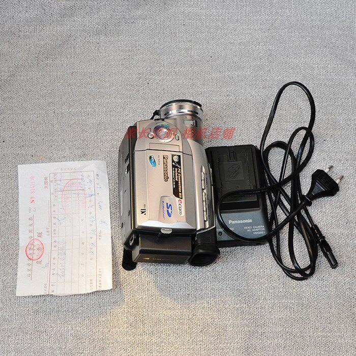 Panasonic nv-ds38 minidv tape camera on the front of the camera