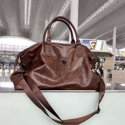 Travel bag men's large capacity Hand bag Korean version of short luggage bag travel travel boarding bag sports fitness bag tide