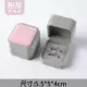 Восьмиугольная коробочка для колец розово-серого цвета.