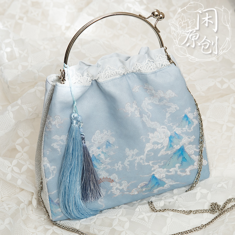 Leisure original splendid mountains and rivers printed lace handmade tassel fairy Hanfu cheongsam hand-held messenger mouth gold bag