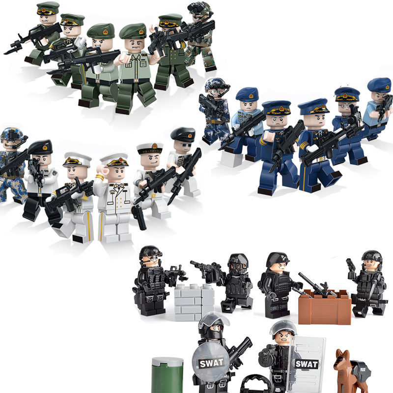 The military parade military little boy doll, sea, land and air force armed special police assembly building block gun weapon boy toy
