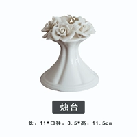 Высокий подсвечник с прищипнутыми цветами