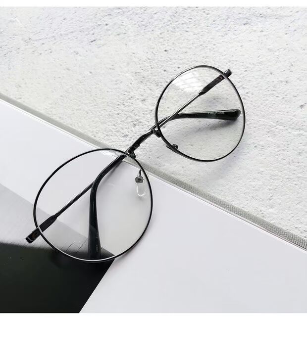 Phiên bản Hàn Quốc của kim loại chân mỏng khung hình bầu dục kính khung nữ thời trang retro xu hướng trang trí đơn giản kính phẳng gương - Kính khung mắt kính gentle monster