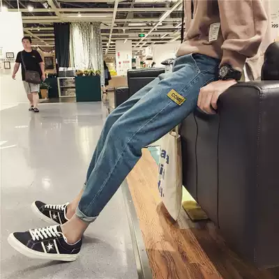 Gangfeng autumn new letter cloth stickers Joker jeans men Korean version of slim leg pipe pants student Haren pants