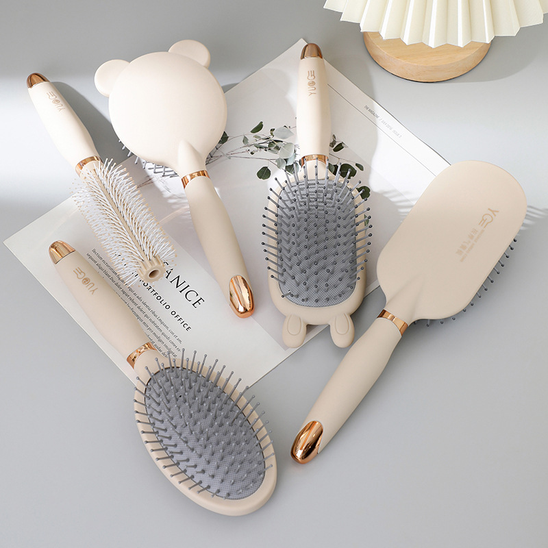 The airbag comb massage the scalp of the special cartoon mat comb is of high face value and carries anti-static fluff loose curly comb