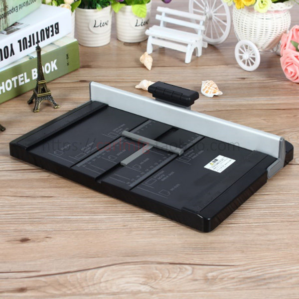 Japan CARL Small Roller B5 Paper Cutter DC-110 Safety Hand Push Ticket Joint Tooth Line Cutter 10 Sheets