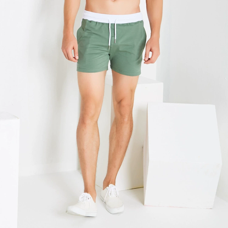 Quần short cotton thể thao nam ba quần thể thao quần thể dục bó sát chạy siêu ngắn gợi cảm quần tây nam