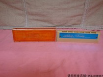 Functional and easy to use early production of plastic harmonica instruments with original packaging box to collect nostalgic old-fashioned second-hand items