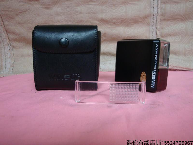 Old camera with MINLTK Minolta 1800AF PROGRAM flash nostalgic second-hand vintage objects