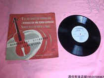 Old record player with violin concerto The sun shines on Tashkurgan 33 turn LP vinyl record second-hand