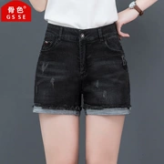 Màu xương hè 2019 mới quần short denim màu đen mèo nữ phải cào rách phiên bản Hàn Quốc của quần lọt khe thon gọn nóng bỏng - Quần short