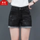 Màu xương hè 2019 mới quần short denim màu đen mèo nữ phải cào rách phiên bản Hàn Quốc của quần lọt khe thon gọn nóng bỏng - Quần short