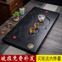 Wu Jinshi tea tray Whole stone volcanic stone rectangular tea set Tea sea simple household stone Black Jinshi tea table