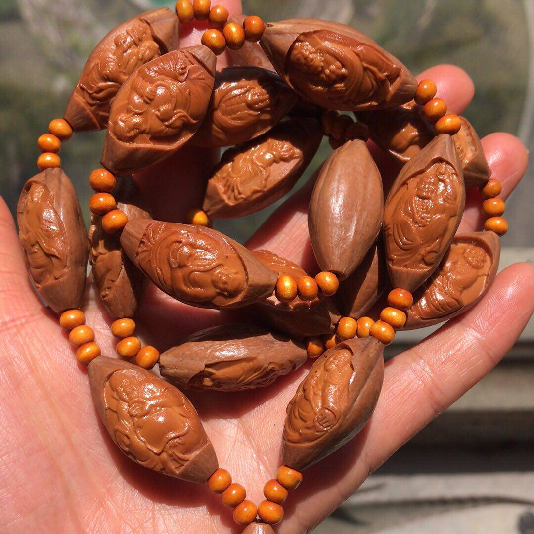 Wen played olive core hang with the original skin eighteen Luohan long string of 18 Luohan necklace olive core carved man