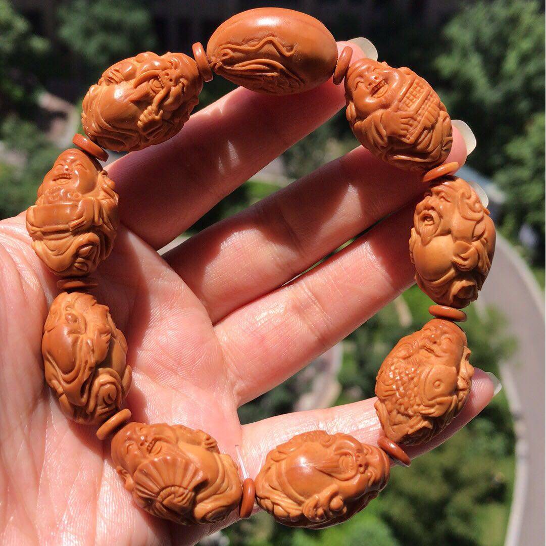 Olive nuclear sculpted hand string of fish Cairochaeen playlist Play in hand string of men's olive nuclear chaemion hand strings South work nuclear carvings for the financial strings