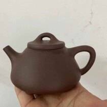 Yixing purple clay teapot original mine Cultural Revolution purple mud seven-hole water stone ladling pot pure handmade