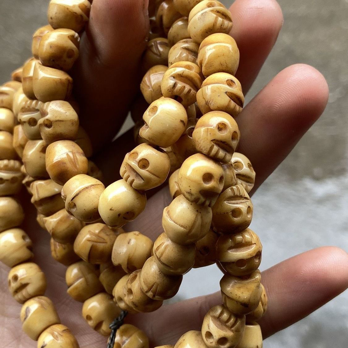 藏传牦牛骨骷髅头佛珠项链2025收藏新潮流？