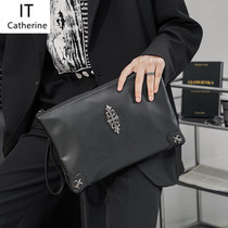 Hong Kong 2022 genuine leather mens hand holding pack trendy rivets wrist bag casual single shoulder inclined cross-pack for men and women handbags