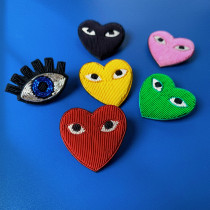 Metal wire hand embroidered love badge with eyes red heart eyes cartoon brooch Japanese anti-light pin tide