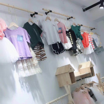 Clothing store decoration color display rack on the wall hanger clothes shop decoration effect childrens clothing store shelves