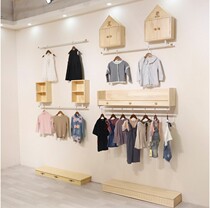 Clothing store side hanging shelf childrens clothing store decoration retro original solid wood white wall display stand front side hanging combination rack
