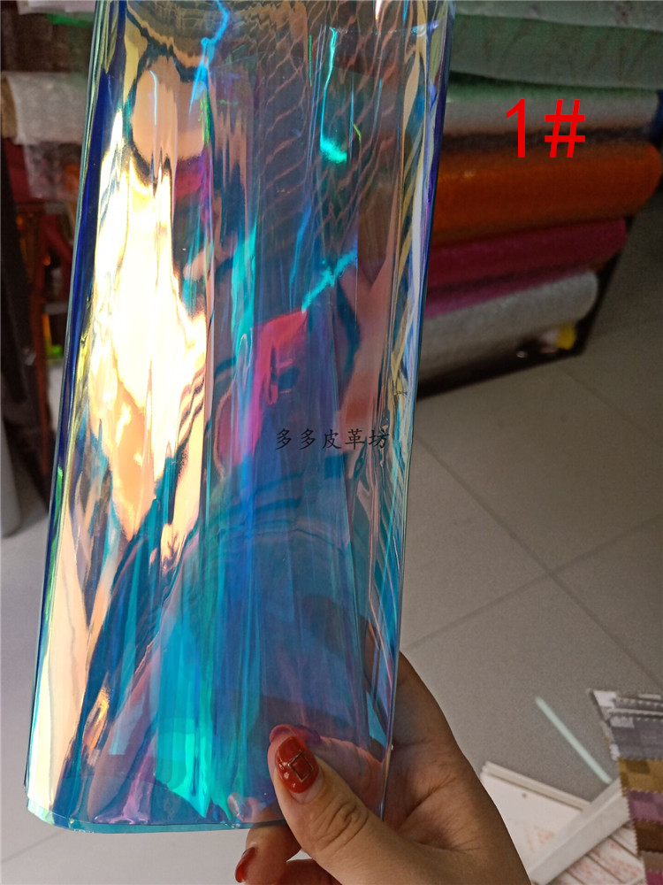 Thời trang mới đầy màu sắc trong suốt thạch laser thạch PVC ánh sáng khăn trải bàn 0.4mm túi thủ công vải DIY vải may quần tây nữ
