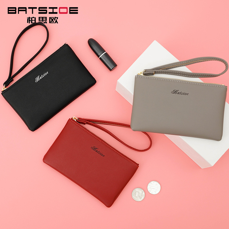 Small wallet 2022 new simple solid color clutch bag medium and long version lipstick storage bag women's Korean version of the small handbag