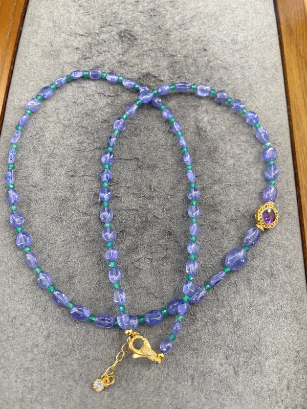 Natural Color Standard: Extremely Tanzanite and Ocean Blue Tahiti, the Pinnacle of the Forbidden City