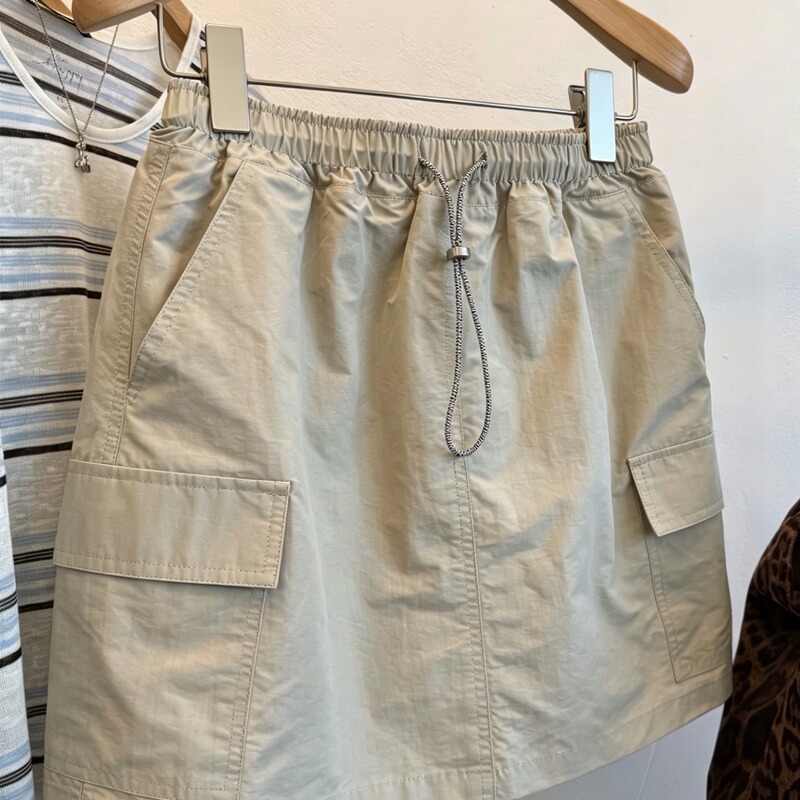 Korean-Style Khaki Workwear-Style Culottes for Women, Summer Drawstring Waist-Cinching Pocket Skirt, Anti-Exposure A-Line Short Skirt Korean-Style Khaki Workwear-Style Culottes for Women, Summer Drawstring Waist-Cinching Pocket Skirt, Anti-Exposure A-Line Short Skirt