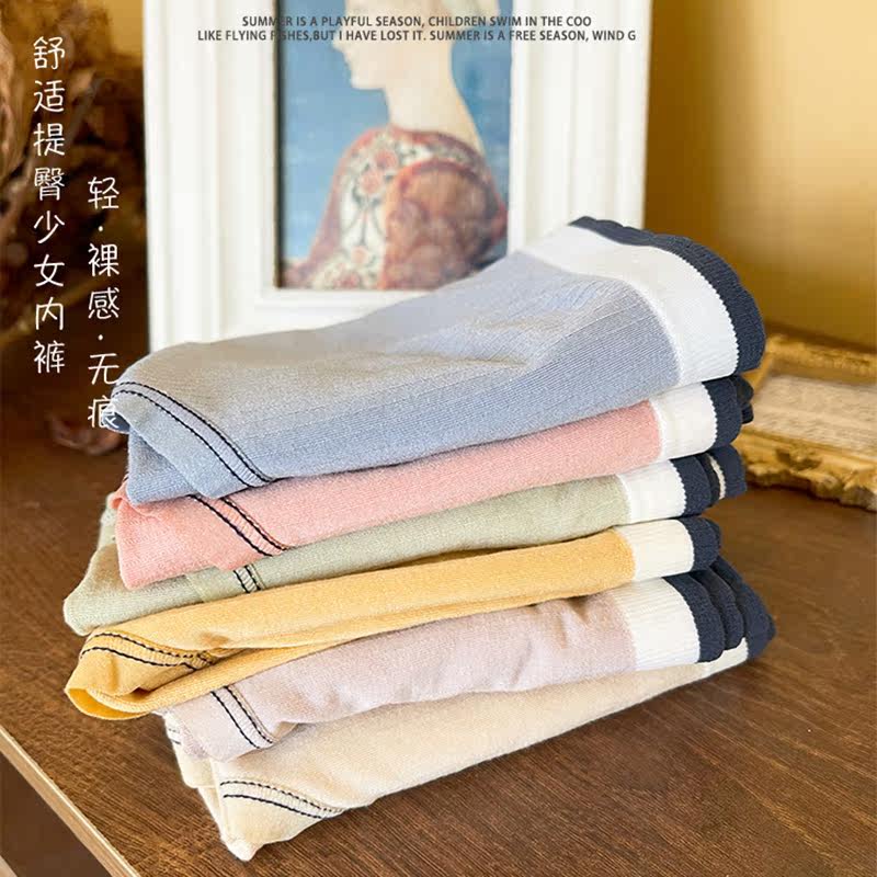 Super soft and comfortable close-fitting pure desire girl series solid color modal high elastic buttocks seamless mid-waist briefs women