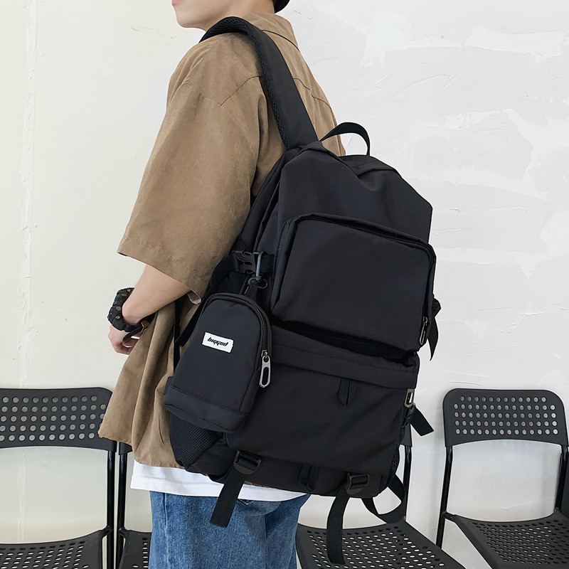 high school college student men's fashion boomer double shoulder bag 2020 new school bag large capacity Korean version minimalist casual bag