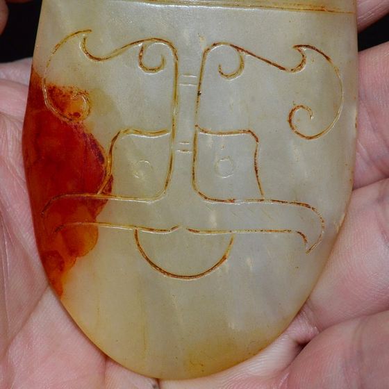 Ancient jade old jade high ancient Hetian jade white jade partial red skin Qin spring and autumn war Han auspicious door god animal face protection token