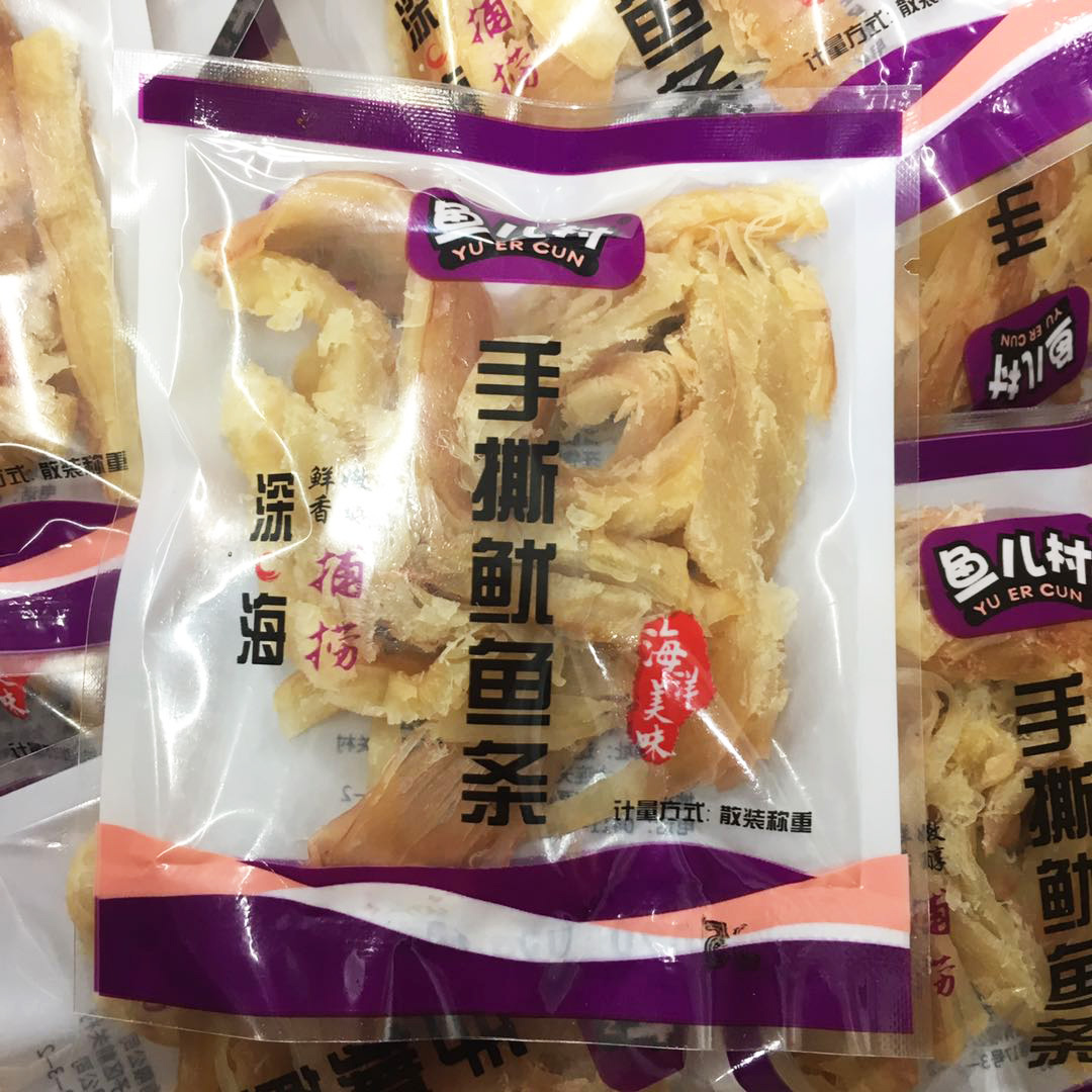 Dalian Terrific fish village hand ripping squid strips 1000 grams of independent small package baked squid fish silk ready-to-eat seafood snacks
