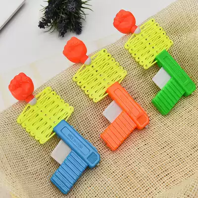 Funny whole person magic elastic telescopic fist gun children's toys Post-80s childhood nostalgic classic Yiwu stall