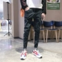 2019 thu đông mới quần jeans nam chân thon phiên bản Hàn Quốc theo xu hướng của bé trai Hồng Kông gió đen quần nam - Quần jean quần áo thể thao nam