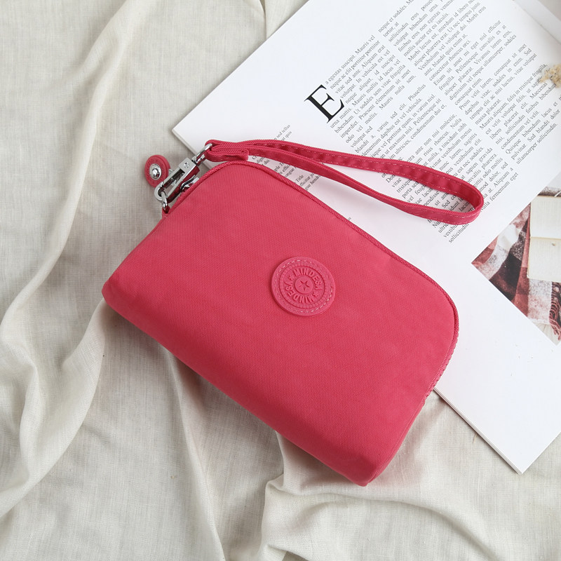 Nylon Oxford cloth waterproof women's clutch bag small simple light single-layer change passport mobile phone cosmetics hand bag