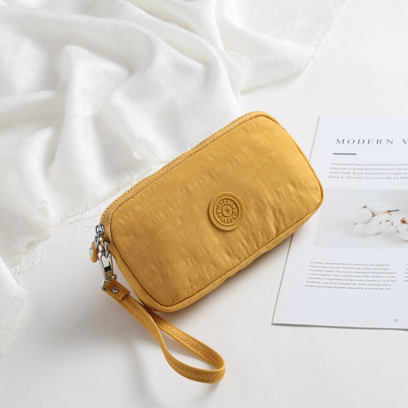 Clutch bag women's waterproof nylon fabric simple large-capacity light change mobile phone cosmetics storage hand bag