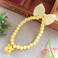 Желтая голова медведя -пуха