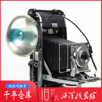 Antique old object Polaroid 110A leather cavity folding organ camera with flash light with case